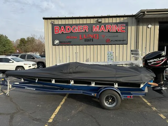 Slide: The Image of 1989 Hydrostream Vegas XT boat with cover at Badger Marine dealership. - 28