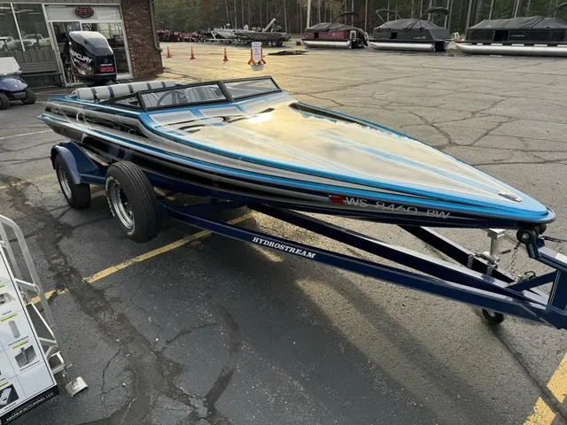 Slide: The Image of 1989 Hydrostream Vegas XT speedboat on trailer in parking lot. - 6
