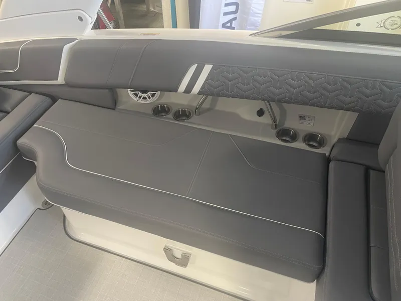 Slide: The Image of 2025 Regal LS9 boat interior with sleek seating and modern design. - 7