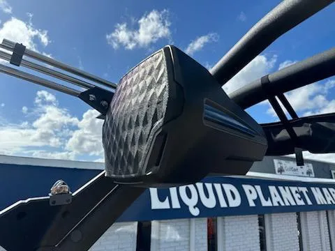 Slide: The Image of 2025 Malibu M230 boat speaker against a blue sky backdrop. - 38