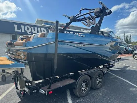 Slide: The Image of 2025 Malibu M230 dashboard with digital displays and modern steering wheel. - 5