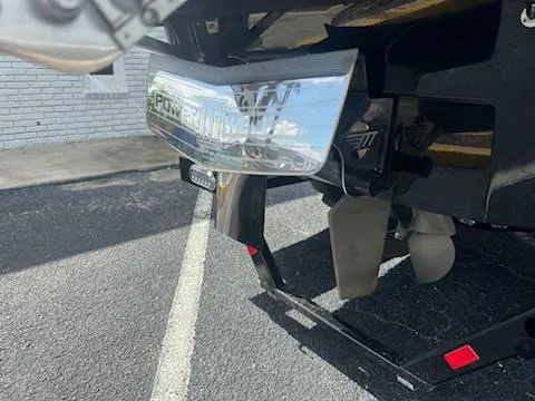 Slide: The Image of 2025 Malibu M230 interior with tan leather seats, cup holders, and control panel. - 7