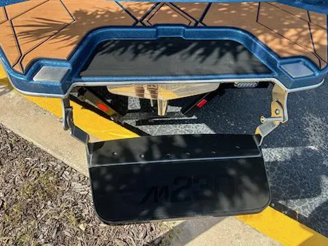 Slide: The Image of 2025 Malibu M230 interior with stylish seating and cup holders. - 8