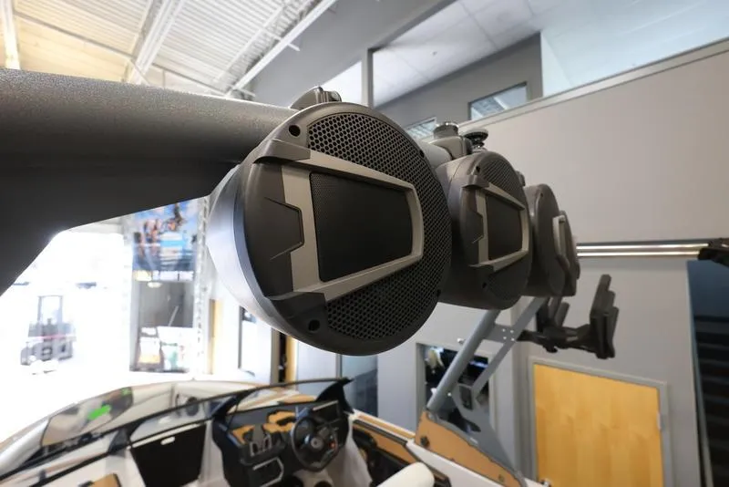 Slide: The Image of 2024 Axis T250 boat speakers in a showroom setting. - 12