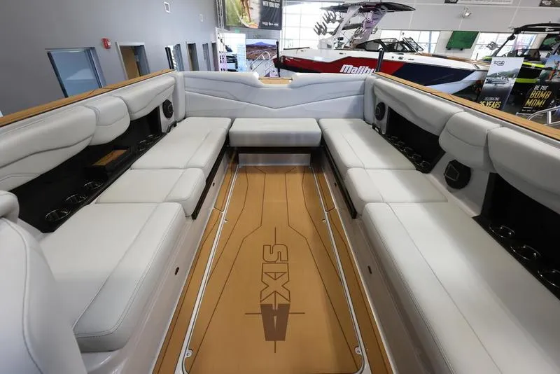 Slide: The Image of 2024 Axis T250 boat interior with spacious seating and sleek design. - 16
