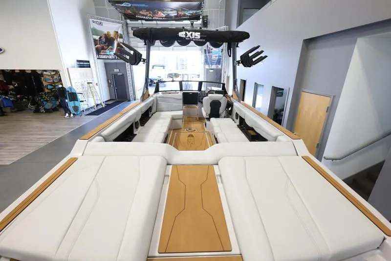 Slide: The Image of 2024 Axis T250 boat interior with spacious seating and modern design. - 9