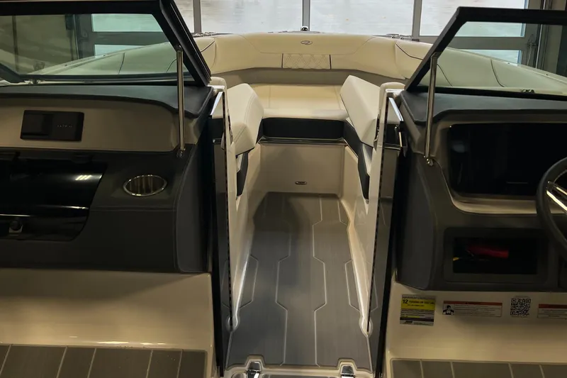 Slide: The Image of 2025 Regal LS2 Surf boat interior with modern seating and sleek design. - 13