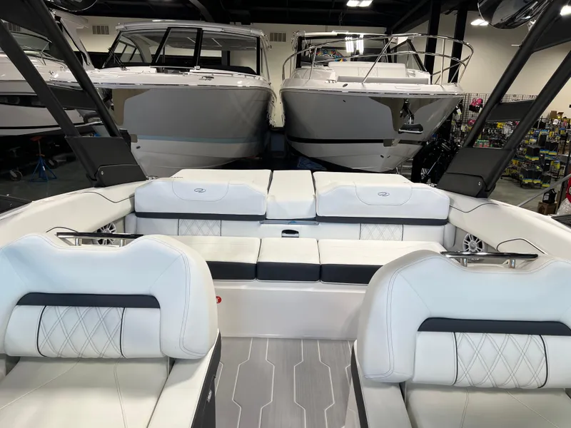 Slide: The Image of 2025 Regal LS2 Surf boat interior with luxurious seating and modern design. - 6
