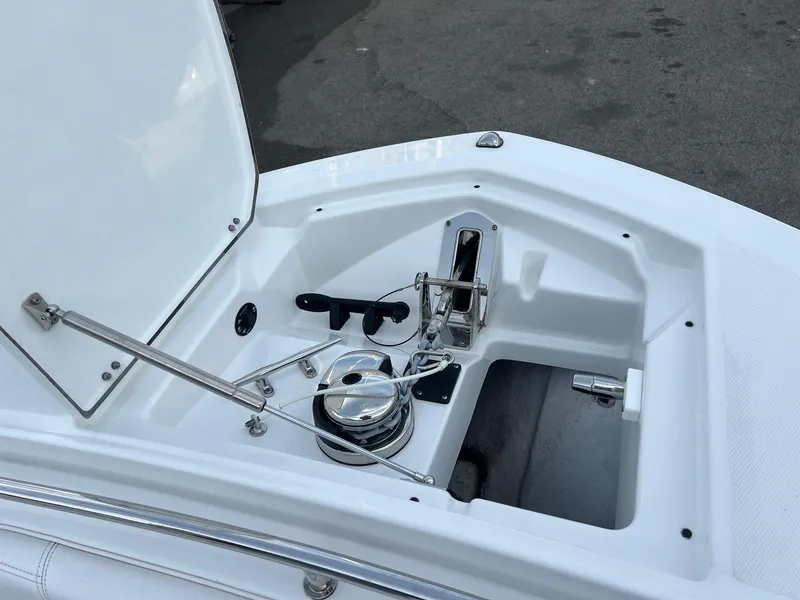 Slide: The Image of 2023 Blackfin 272 CC anchor compartment with stainless steel fittings. - 18