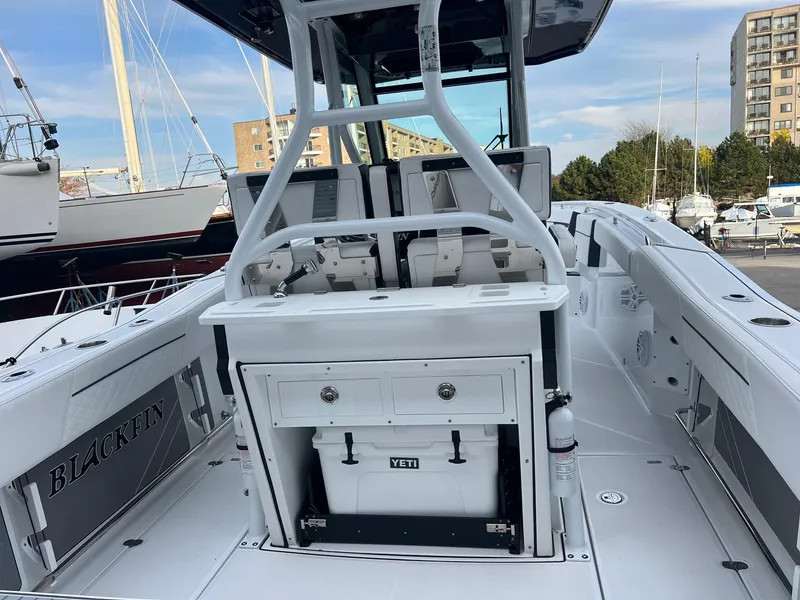 Slide: The Image of 2023 Blackfin 272 CC boat interior with Yeti cooler and seating. - 6