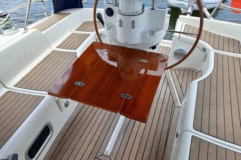 Slide: The Image of Beneteau Oceanis 393 cockpit with wooden table and steering wheel, 2001 model. - 35