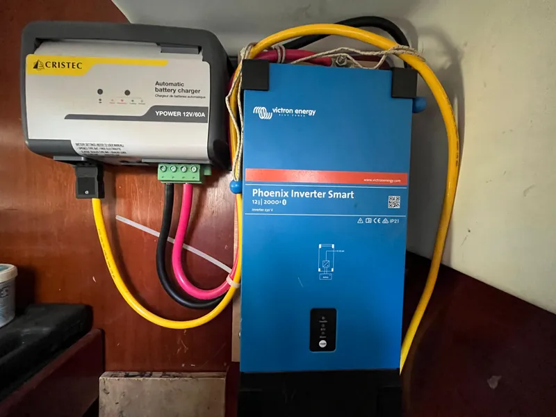 Slide: The Image of Battery charger and inverter setup on a 2001 Beneteau Oceanis 393 sailboat. - 41