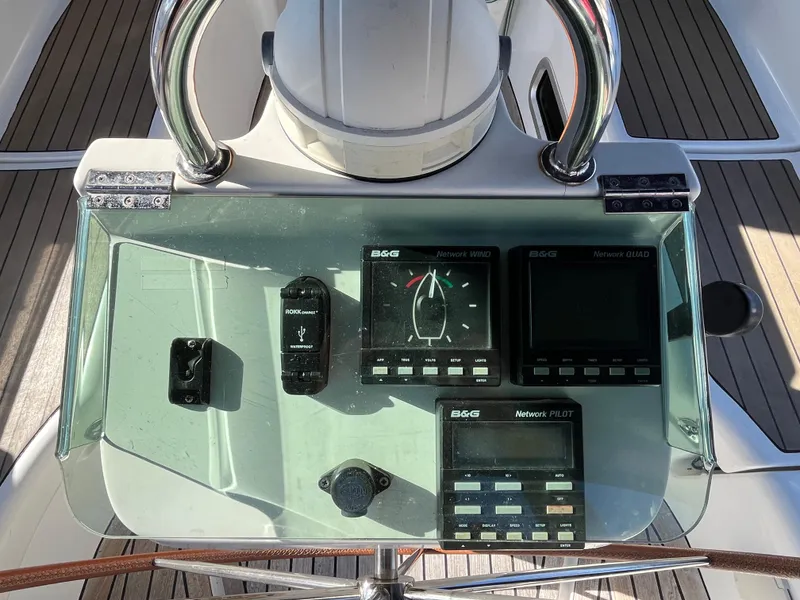 Slide: The Image of Control panel of a 2001 Beneteau Oceanis 393 sailboat with navigation instruments. - 43