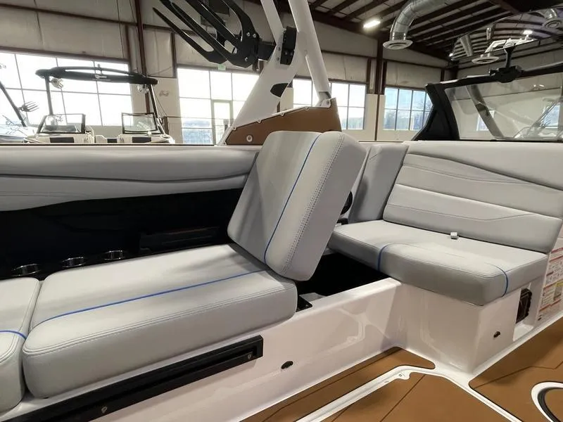 Slide: The Image of Interior of 2025 Axis A225 boat with gray seating and modern design. - 12
