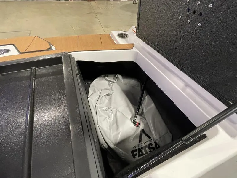 Slide: The Image of Storage compartment of 2025 Axis A225 boat with ballast bag inside. - 25