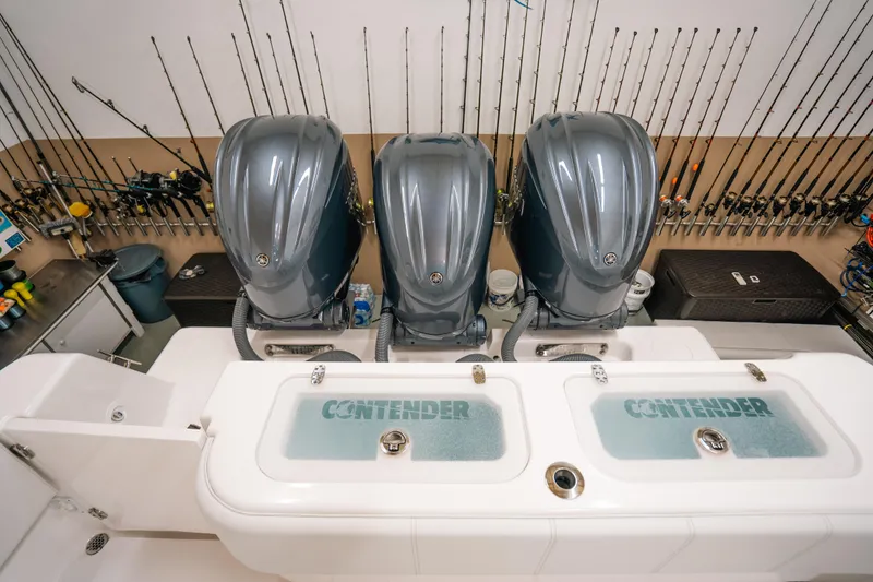 Slide: The Image of 2023 Contender 39 ST boat with triple engines and fishing gear. - 6