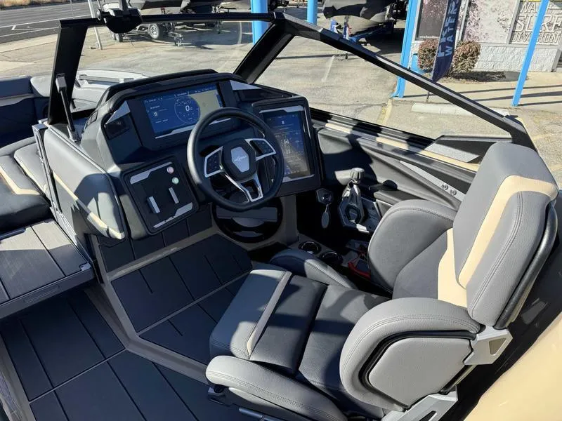 Slide: The Image of 2025 Supra SE boat interior with modern dashboard and steering wheel. - 10