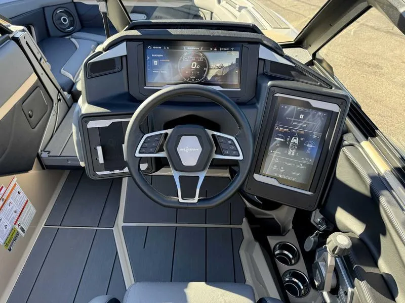 Slide: The Image of 2025 Supra SE dashboard with advanced digital displays and modern steering wheel design. - 11