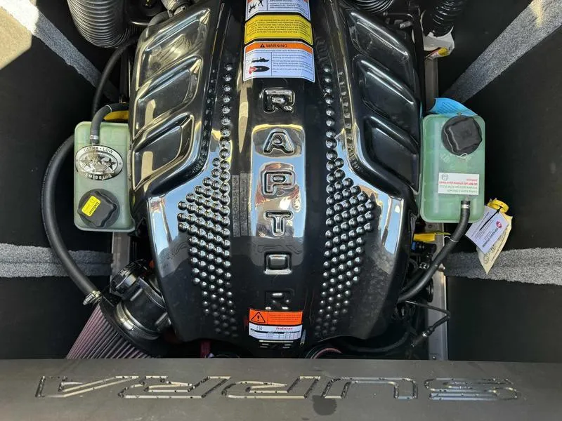 Slide: The Image of 2025 Supra SE engine with Raptor branding, showcasing sleek design and advanced technology. - 13