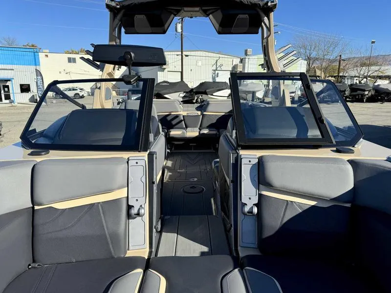 Slide: The Image of 2025 Supra SE boat interior with modern seating and sleek design. - 15