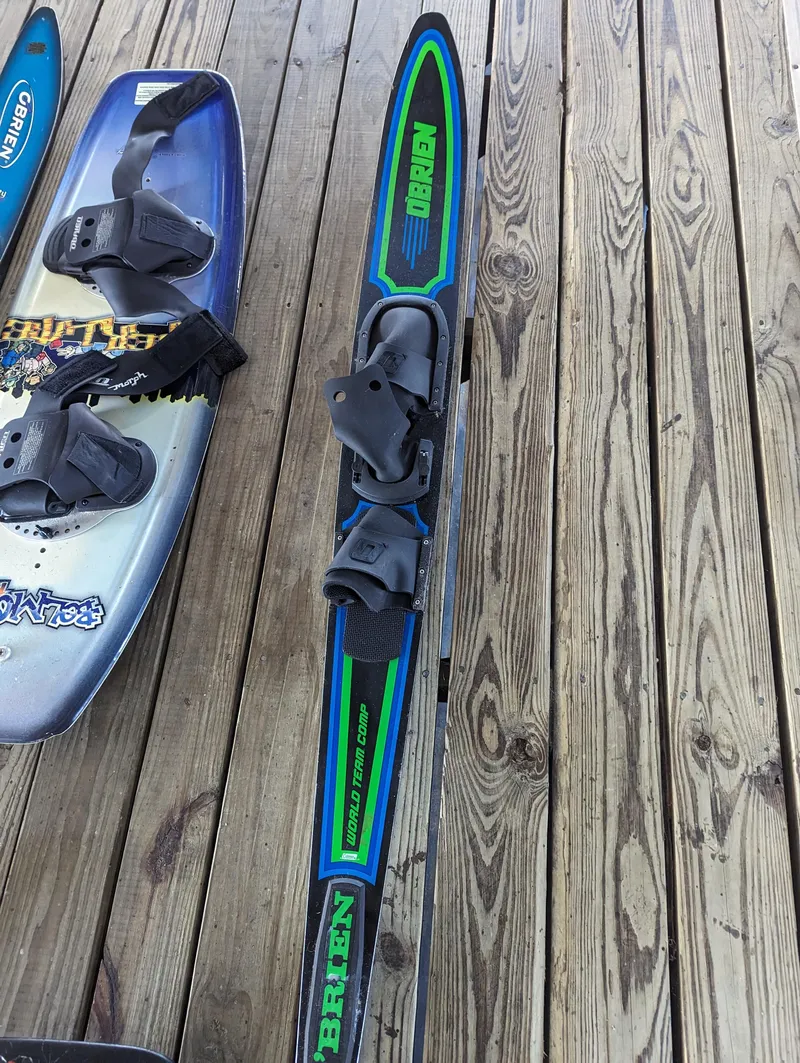 Slide: The Image of Water skis and wakeboard on wooden dock, Sea Ray 240 Sundeck 2006. - 23