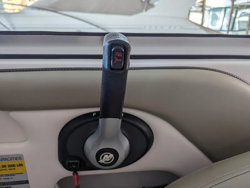 Slide: The Image of Throttle control of 2006 Sea Ray 240 Sundeck boat interior. - 40