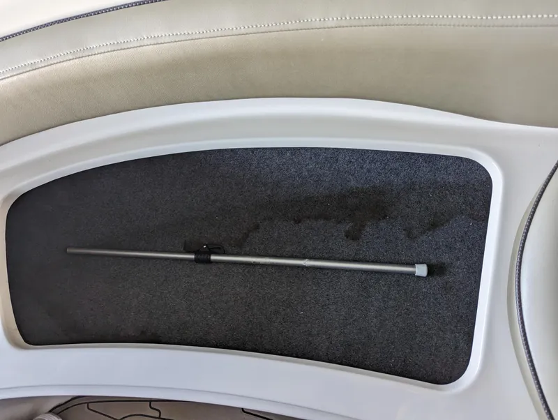 Slide: The Image of Storage compartment in 2006 Sea Ray 240 Sundeck boat interior. - 48