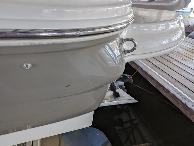 Slide: The Image of Close-up of 2006 Sea Ray 240 Sundeck boat stern near dock. - 5