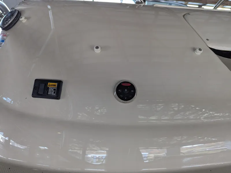 Slide: The Image of Close-up of 2006 Sea Ray 240 Sundeck dashboard controls. - 8