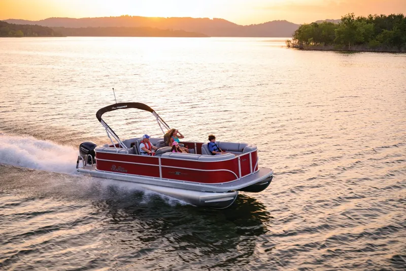 Slide: The Image of Dashboard of 2025 Sun Tracker Party Barge 22 DLX with BOATS sign in background. - 16