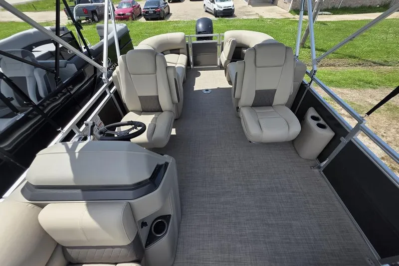 Slide: The Image of 2025 Sun Tracker Party Barge 22 DLX interior with spacious seating and modern design. - 18