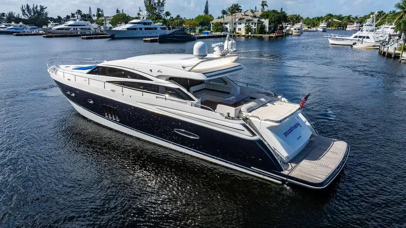 Slide: The Image of Luxurious 2010 Princess V78 yacht cruising in a serene marina setting. - 18