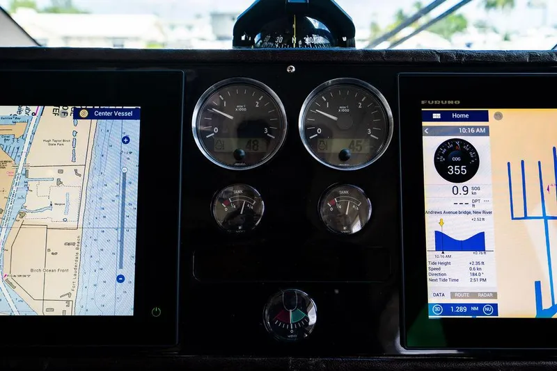 Slide: The Image of Dashboard of 2010 Princess V78 yacht with navigation and control instruments. - 30