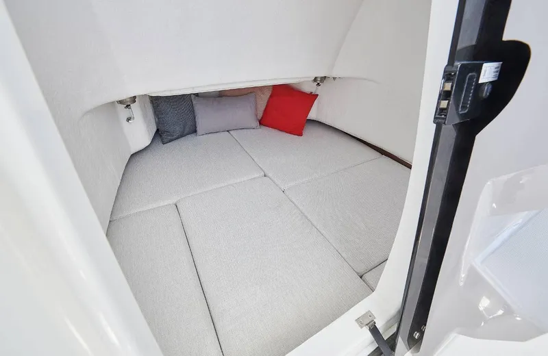 Slide: The Image of Cozy cabin interior of 2023 Jeanneau Leader 7.5CC S3 with cushions. - 12