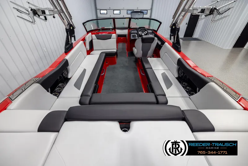 Slide: The Image of Interior of 2021 MasterCraft NXT24 boat with spacious seating and modern design. - 13