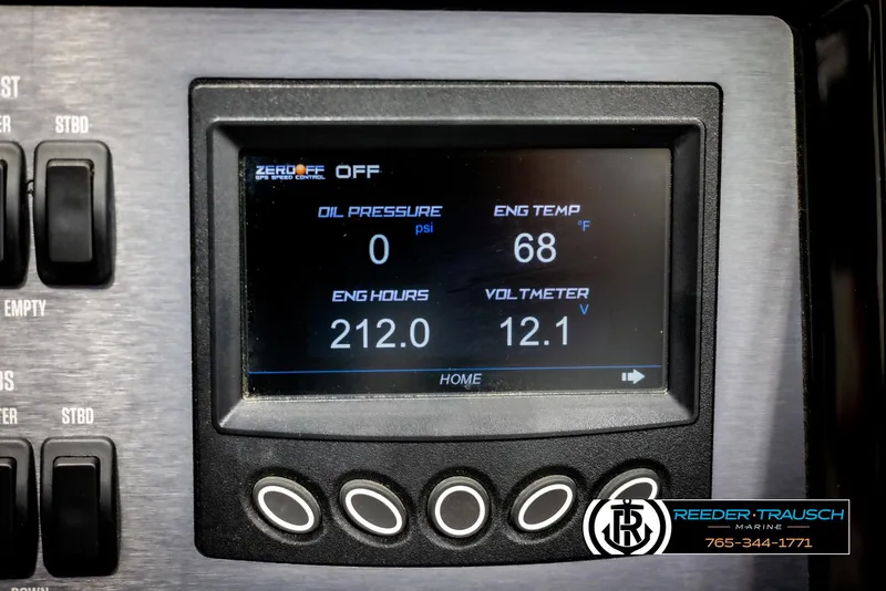 Slide: The Image of Dashboard display of a 2021 MasterCraft NXT24 showing engine metrics. - 36