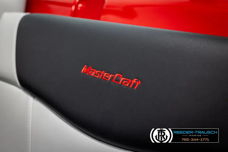 Slide: The Image of Close-up of 2021 MasterCraft NXT24 boat seat with logo embroidery. - 39