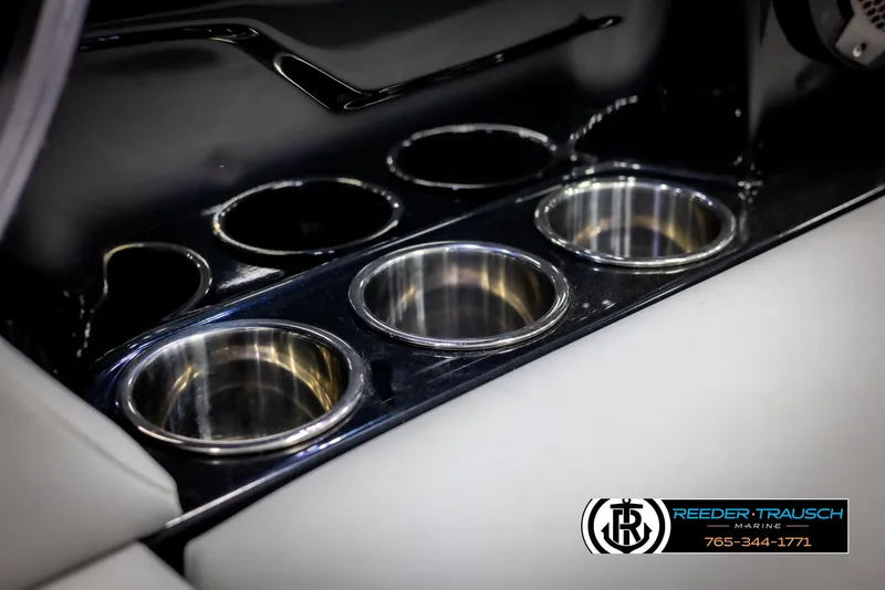 Slide: The Image of MasterCraft NXT24 2021 boat cup holders, sleek design, Reeder-Trausch Marine branding. - 41