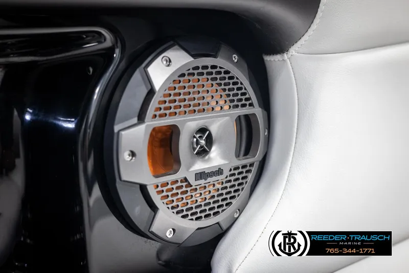 Slide: The Image of Close-up of a 2021 MasterCraft NXT24 boat speaker with Reeder-Trausch Marine logo. - 42