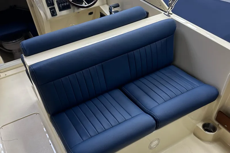 Slide: The Image of Blue seating in 2025 Rossiter 23 boat interior, featuring modern design and comfort. - 19