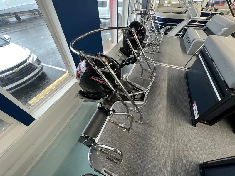 Slide: The Image of 2025 Crest Classic 220 boat interior with motor and seating. - 5