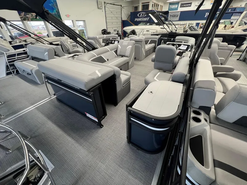 Slide: The Image of 2025 Crest Classic 220 pontoon boat interior with luxurious seating and modern design. - 6