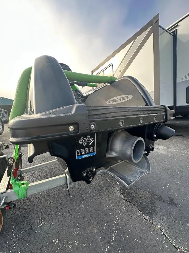 Slide: The Image of 2021 Kawasaki Jetski SX-R rear view on trailer, showcasing hydro-turf design. - 22
