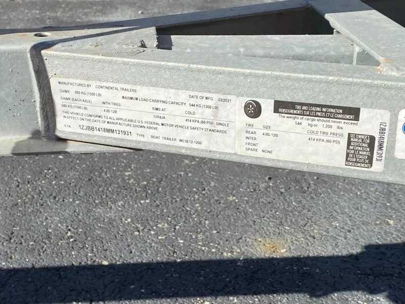 Slide: The Image of Label on trailer for 2021 Kawasaki Jetski SX-R, showing specifications and manufacturing details. - 9