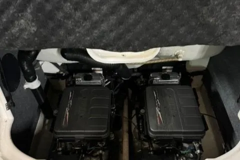 Slide: The Image of Engine compartment of a 2007 Yamaha Boats SX230, featuring dual engines. - 15