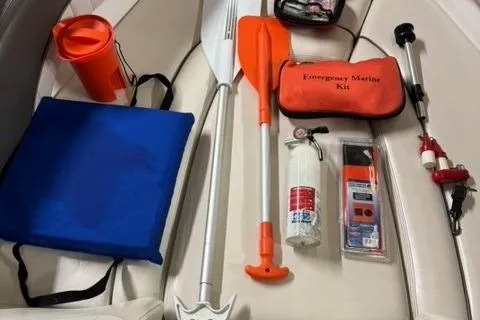 Slide: The Image of Safety equipment on a 2007 Yamaha Boats SX230, including oars, marine kit, and fire extinguisher. - 17