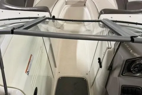 Slide: The Image of 2007 Yamaha Boats SX230 interior view with seating and windshield. - 23