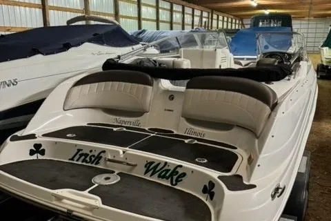 Slide: The Image of 2007 Yamaha Boats SX230 in storage, featuring "Irish Wake" text on the back. - 6