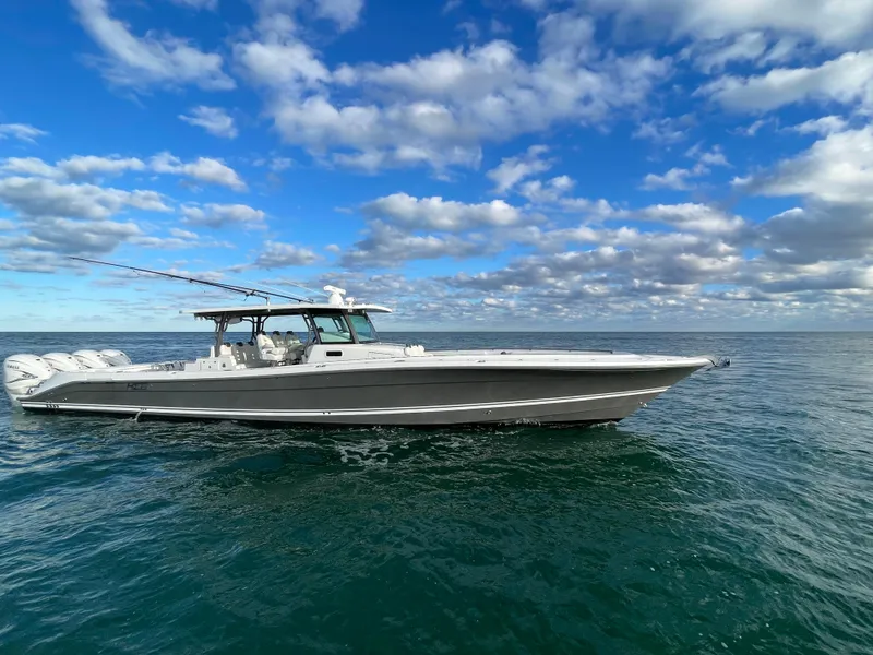 Slide: The Image of 2019 HCB 53 Sueños boat on open sea under blue sky. - 0