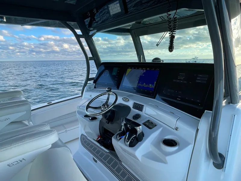 Slide: The Image of Interior view of 2019 HCB 53 Sueños boat with ocean backdrop. - 12